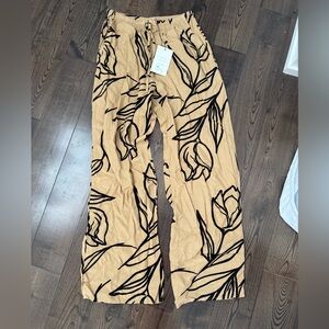 Stitch and feather pants small NWT